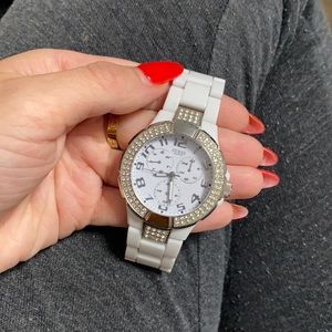 White and silver guess watch